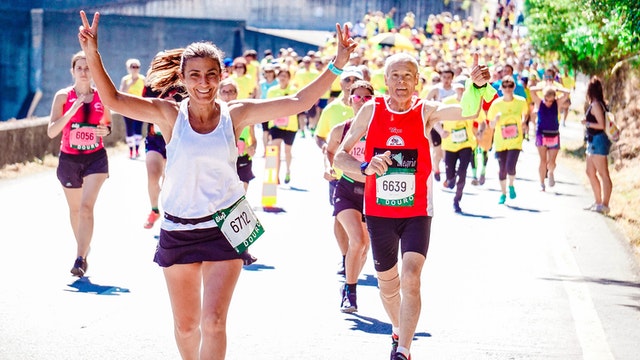 People Celebrating Finishing Marathon, You must finish what you start to feel accomplished in life. The joy of finishing what your start is unparalleled. Blog Post By Gaurav Sinha 