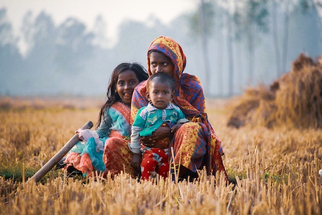 A woman sitting with her kids in a field, in bangladesh. Empathy is a remarkable human quality that allows us to connect with others on a deeper level. Hence it is important for us to develop empathy to make society a better place. Blog Post By Gaurav Sinha